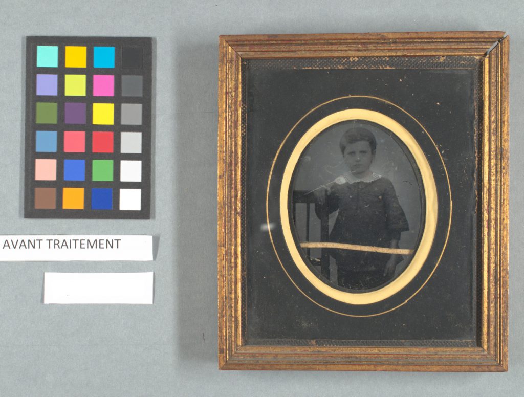 Framed ambrotype - broken photograph on glass - before conservation and restoration treatment